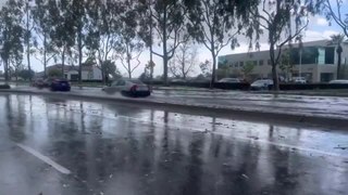 Road Overflows with Water After Thunderstorm and Hailstorm in Lake Forest, California