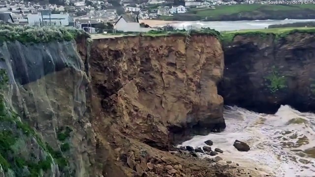 Huge cliff collapses next to luxury homes development site