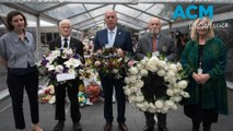 Mourners leave flowers to pay tribute to those killed at Bondi Junction's Westfield