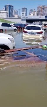 Sharjah Residents in flooded areas notice oil slick for over 2 kilometers in accumulated water