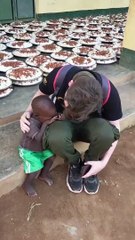 Young Man Compassionate Gesture Towards a Struggling Baby