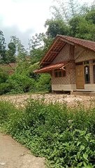 Rumah dusun di daerah pegunungan