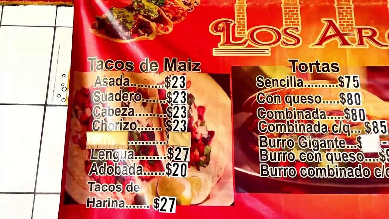 "Una Mordida Tacos Tecate": Taquería Los Arcos