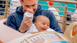 One-year-old in stitches during first roller coaster ride