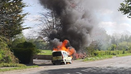 Hero saves elderly couple by dragging them out of burning car