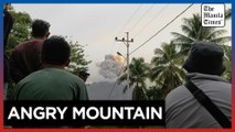 Indonesians on alert as volcano erupts again