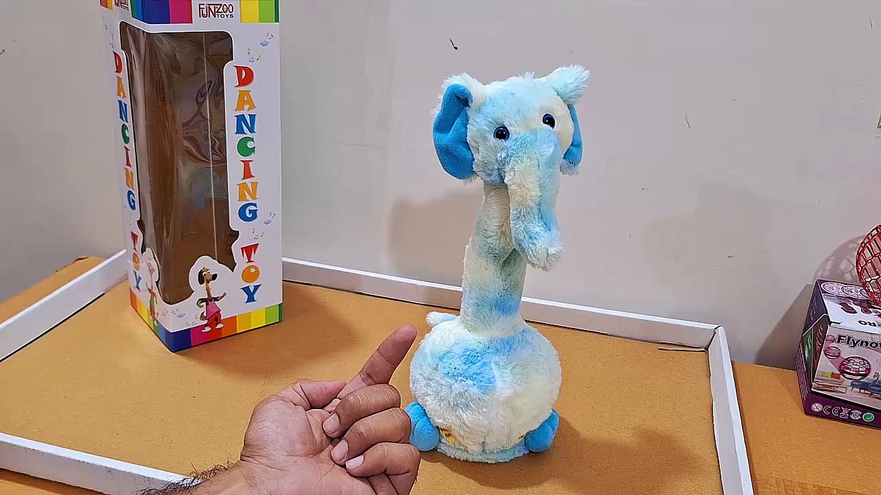 Unboxing and Review of FunZoo Talking elephant Toys for Kids Dancing Toys Can Sing Wriggle Singing Recording Repeat What You Say Funny Education Toys