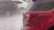 Heavy Hailstorm Damages Several Cars in Parking Lot