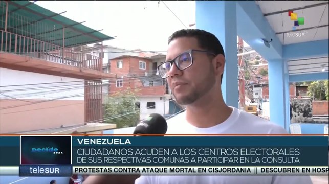 Venezolanos acuden a los centros electorales para participar en la consulta