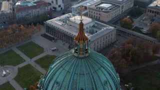 mixkit-golden-cross-on-the-dome-of-a-german-cathedral-31673-medium