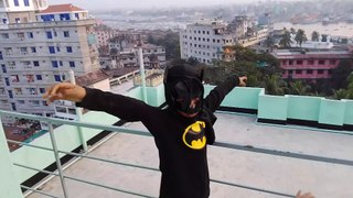 Little Bat Man & His Sister on rooftop of a 21st storied building.