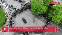 Canını hiçe saydı, drift atan otomobilin üzerine atladı