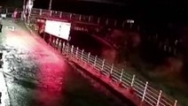 Bridge collapses into river in China during powerful floods