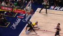 LeBron takes a tumble, still scores