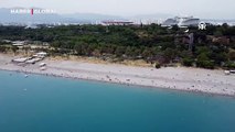 Antalya'nın ünlü sahilleri resmi tatilde de doldu taştı