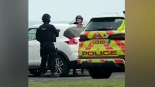 Armed police arrest a man in Seaham