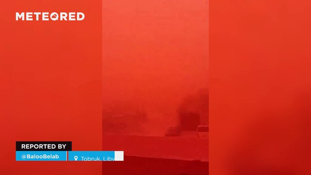 A large sandstorm darkens the sky over eastern Libya