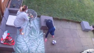 Young boy's unplanned descent through the patio table