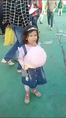 Cute Trishu alone eating cotton candy