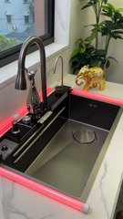 Upgrade your kitchen with this sleek and contemporary waterfall sink, turning it into the centerpiece of your home.