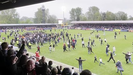 Joe Southan captures the Crawley Town pitch invasion after the play-offs are confirmed