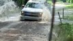 Pickup Truck Falls Into Washout While Crossing Flooded Road