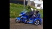 Ballycarry woman Valerie arrives by motorbike to community celebration after picking up a BEM in Kings Birthday Honours