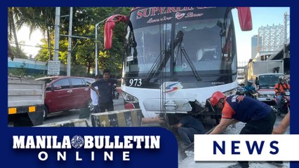 MMDA road emergency group clears debris from bus accident on EDSA-Santolan flyover
