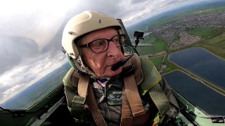 Daredevil OAP marks 86th birthday by flying upside down - in a spitfire