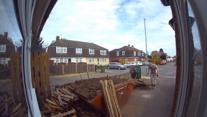Man covers himself in soil after wheelbarrow tips over