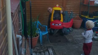 Dad unable to escape after getting stuck in son's toy car