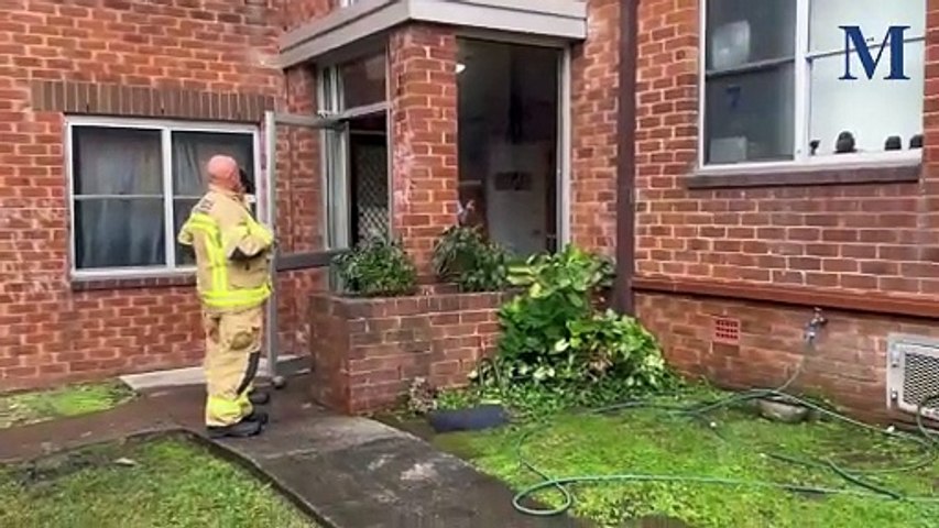 Police are investigating after a trolley full of items was set on fire in the foyer of a unit block at Cliff Road, Wollongong on May 1, 2024. Video by Nadine Morton