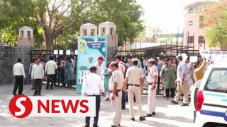 Dozens of schools in India's capital region evacuated after email bomb threat hoax