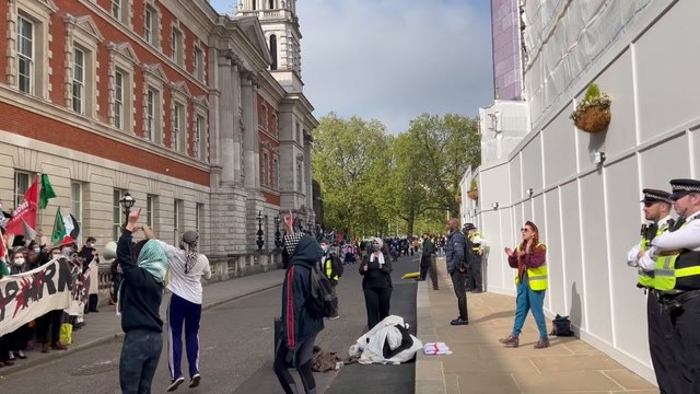 Pro-Palestine protesters gather outside the Department of Business to demand a end to arms export licences to Israel