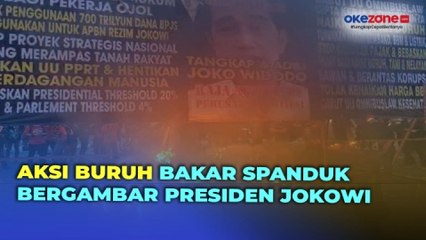 Aksi Buruh di Patung Kuda Bakar Spanduk Raksasa Bergambar Presiden Jokowi