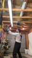 Man Breaks Ceiling Light During Boxing Practice in Garage