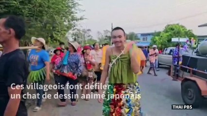 Thaïlande: des villageois défilent avec un chat de dessin animé pour faire venir la pluie