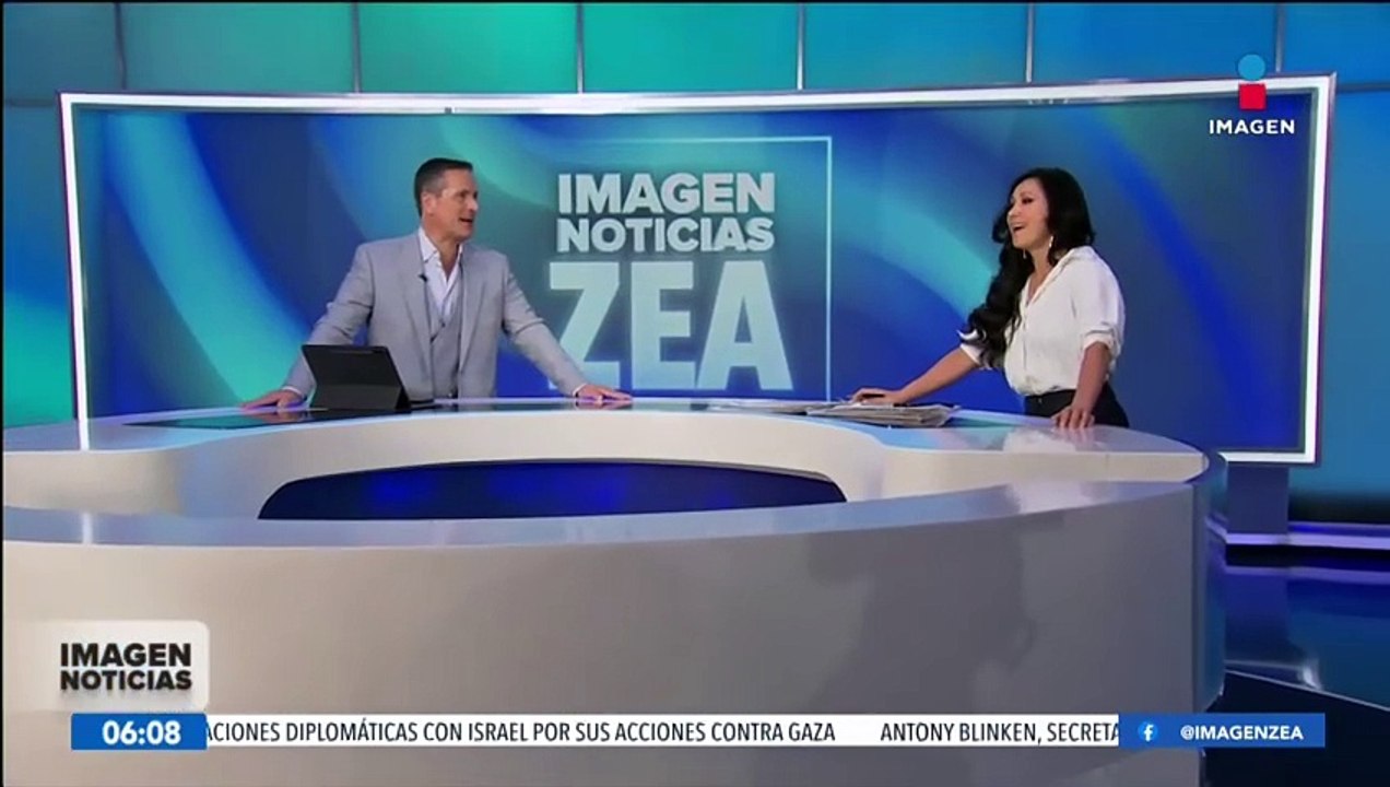 Captan a empleado de gasolinera bañando a un perrito callejero