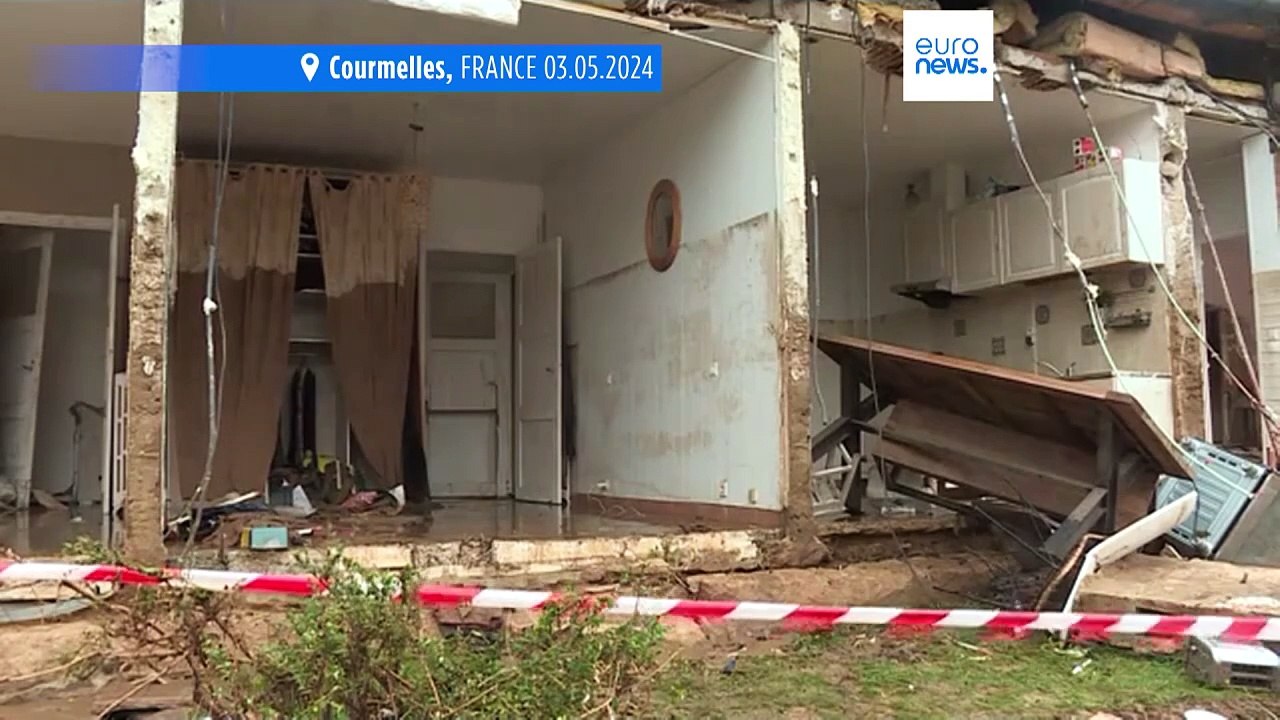 At least one person dead after violent storms h...