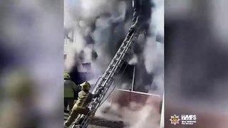 Firefighter rescues man from burning flat