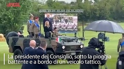 Giorgia Meloni Celebrates at Military Festival Despite Heavy Rain 🌧️