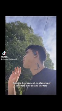 mi può fare una foto