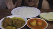 EATING FISH CURRY WITH ARBI, EGG CURRY, WHITE RICE, PAPPAD FRY