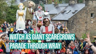 Watch as giant scarecrows parade through Wray