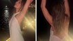 Video: Ilman alusvaatteita, Liz Hurley paljastaa yksityiskohdan liehuvassa mekossa iltakävelyllä kuunvalossa
