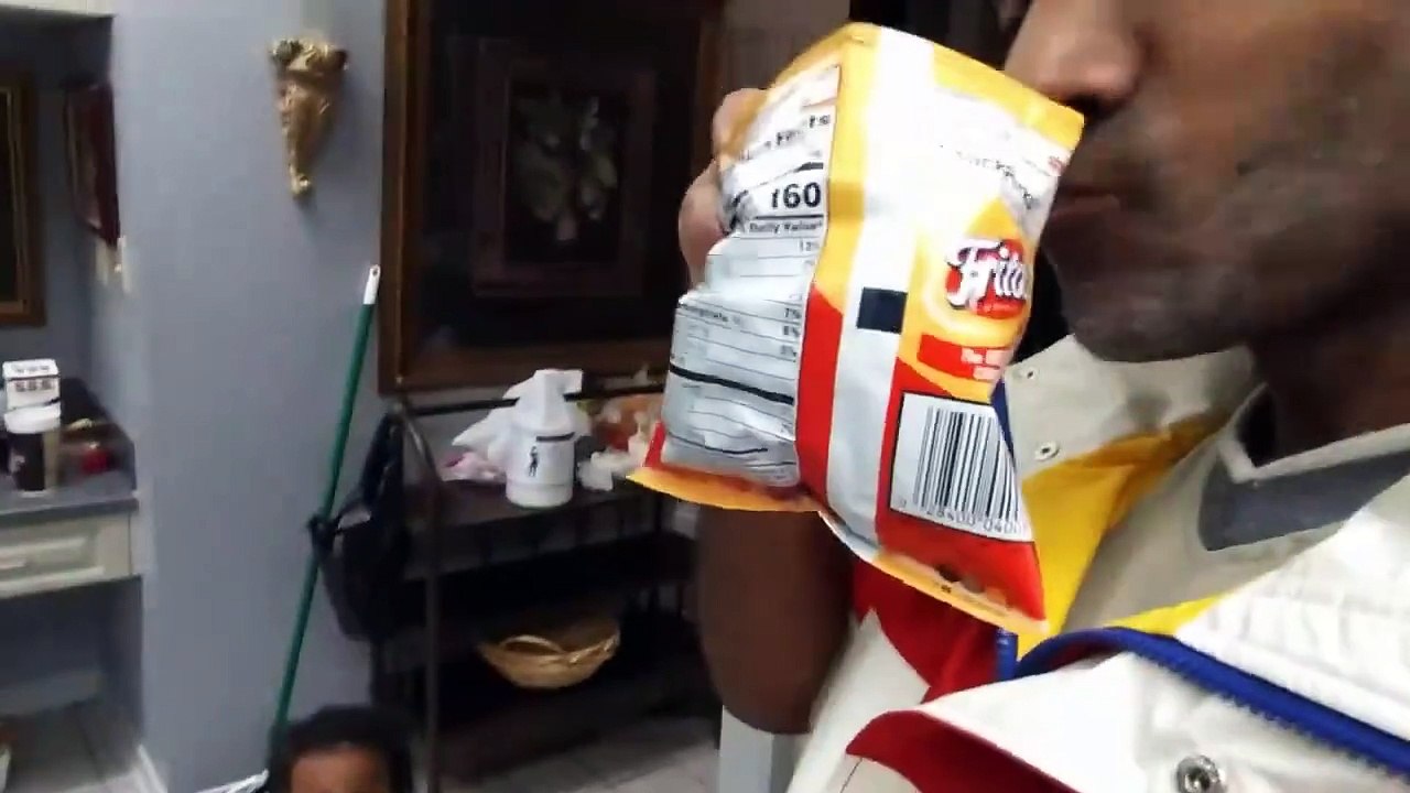 Choking and eating potato chips.