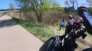 Man Falls in Bushes While Attempting Wheelie on Bike