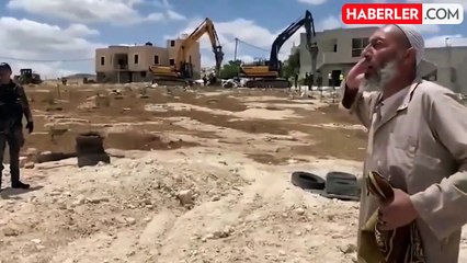 İsrail ordusu tarafından evi yıkılan Filistinli yaşlı adam askerlere ezan okuyarak tepki gösterdi