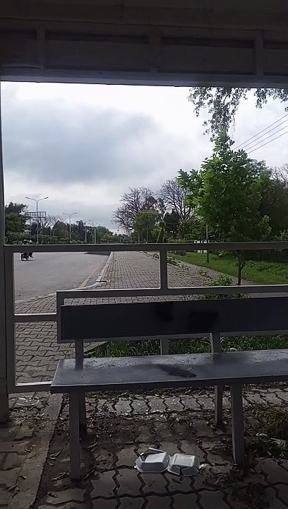 Waiting for bus on bus stop