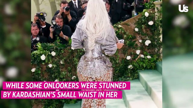 Kim Kardashian Explains Why She's Awkwardly Holding a Sweater at Met Gala